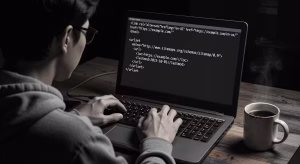 Developer coding hreflang implementation on laptop screen showing HTML tags and XML sitemap structur
